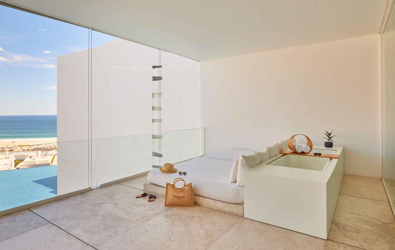 balcony lounge area with beach in background