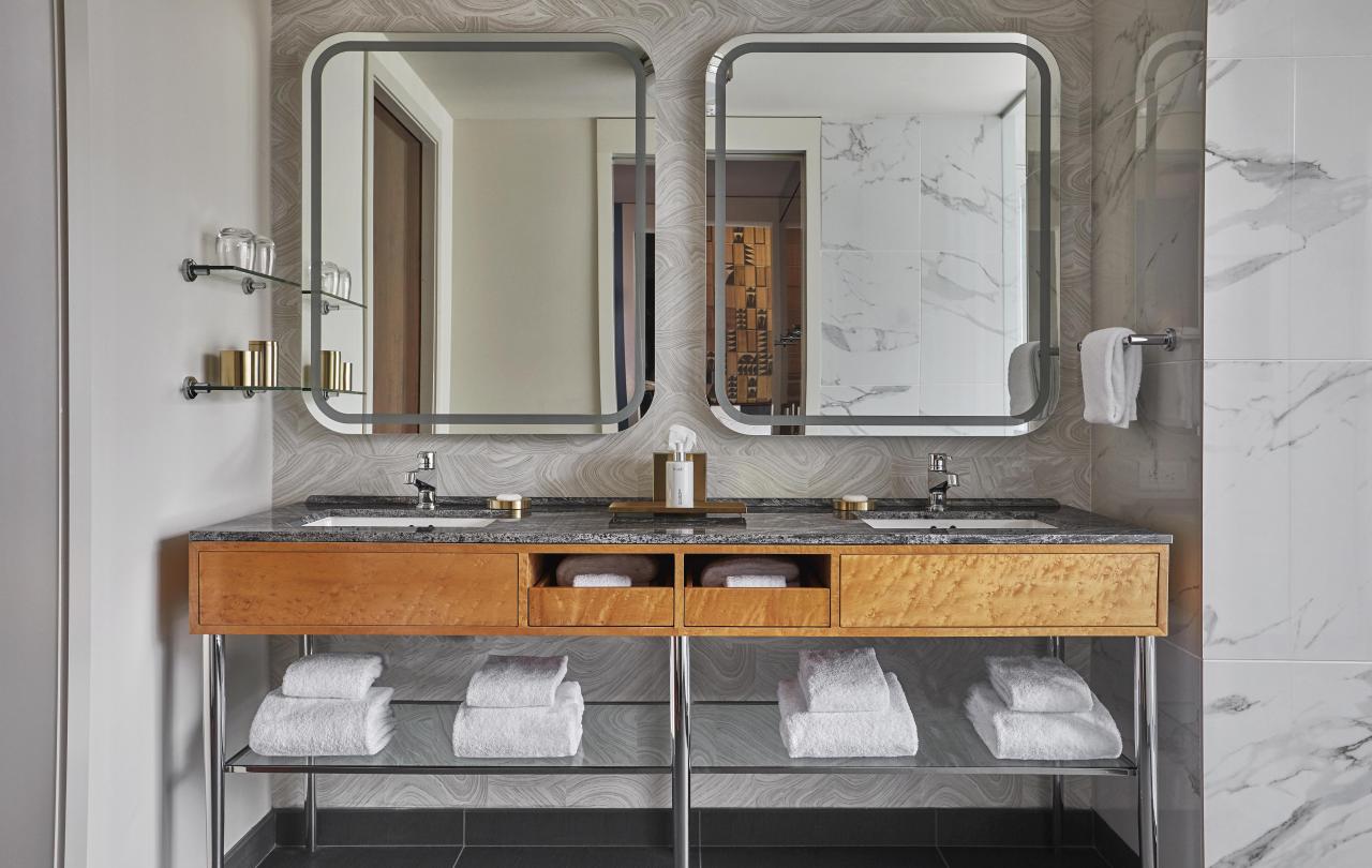 Bathroom vanity with two sinks and two mirrors