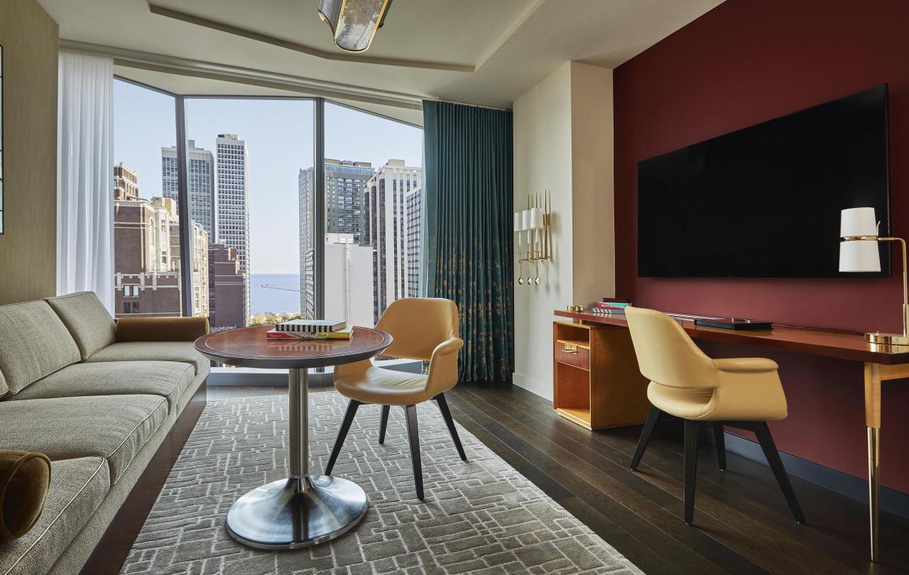 Living room with desk and view of the city