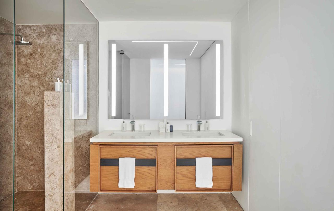 los cabos partial ocean view double sink in bathroom