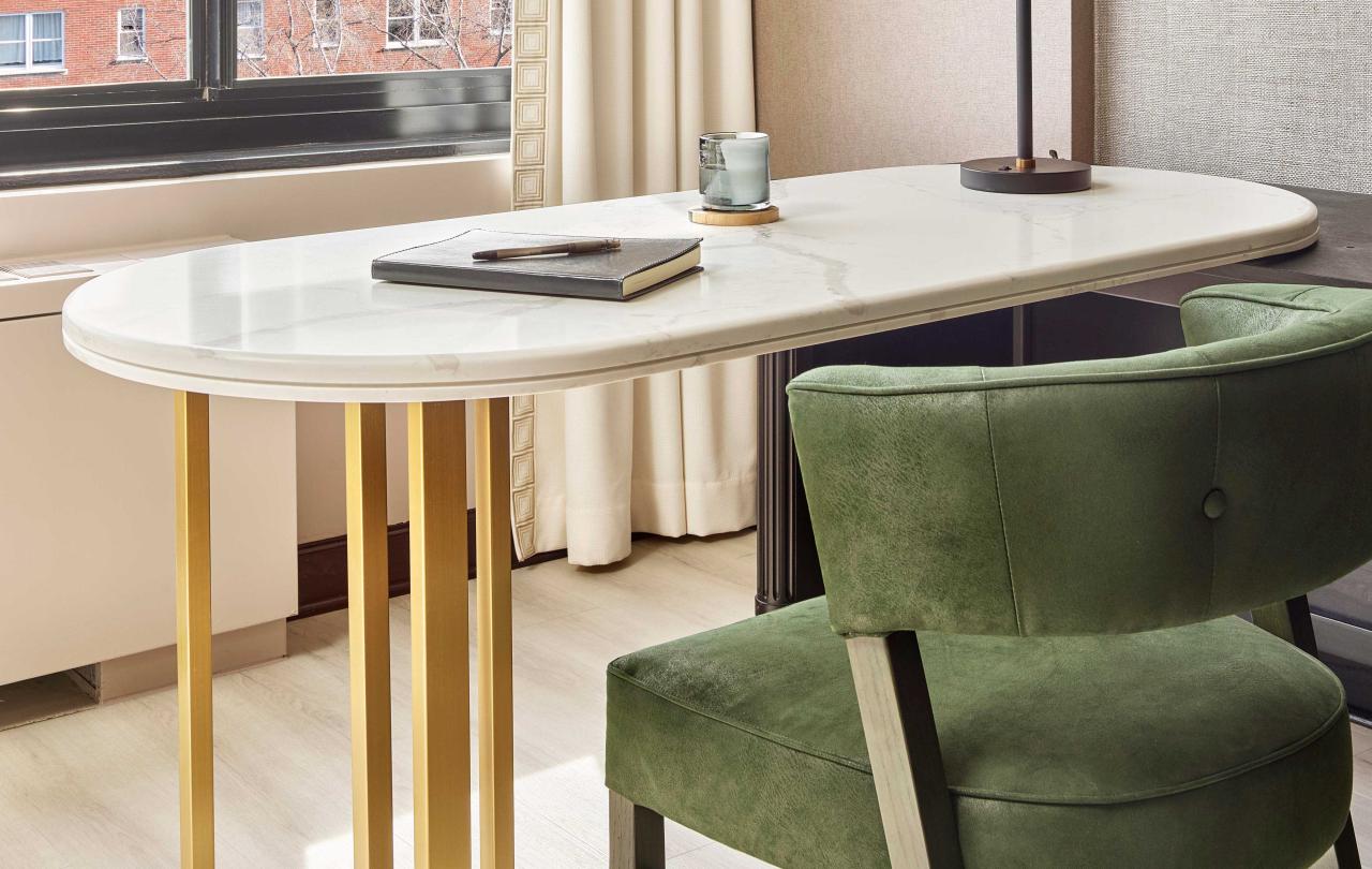 Small desk with a suede green chair