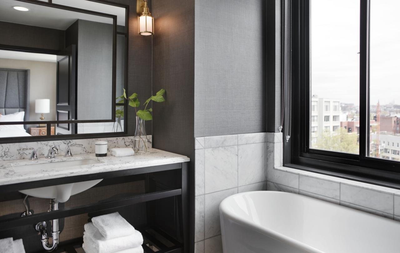 Bathroom with tub and vanity
