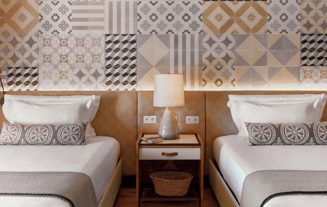 2 queen baed side by side in a deluxe queen room at Viceroy Ombria Algarve