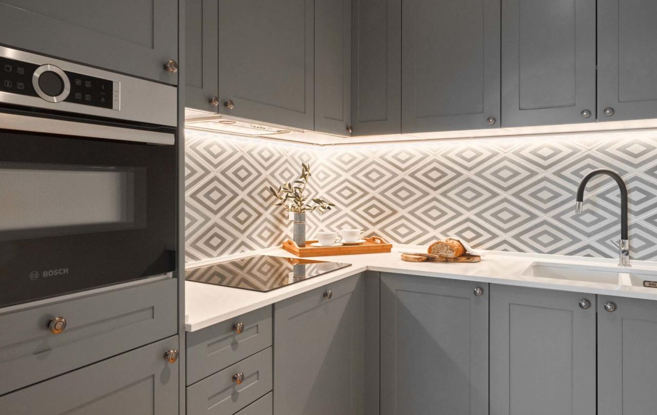 A kitchen with oven, sink and spacious countertop in a two bedroom residence at Viceroy Ombria Algarve