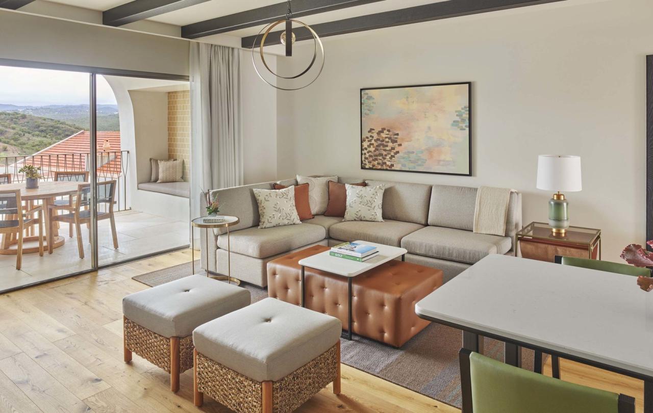 An open living room with valley view in a two bedroom residence at Viceroy Ombris Algarve