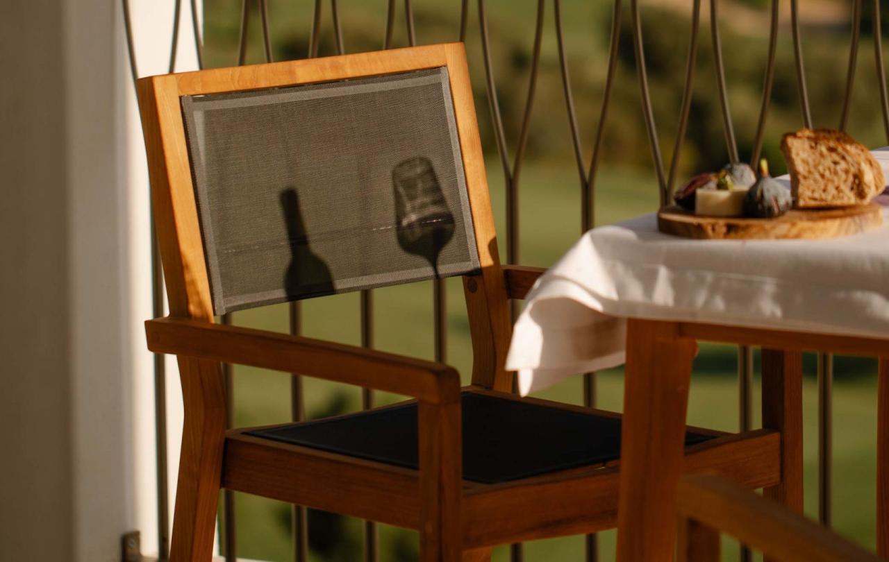 A warm outdoor dining table at a two bedroom residence at Viceroy Ombria Algarve