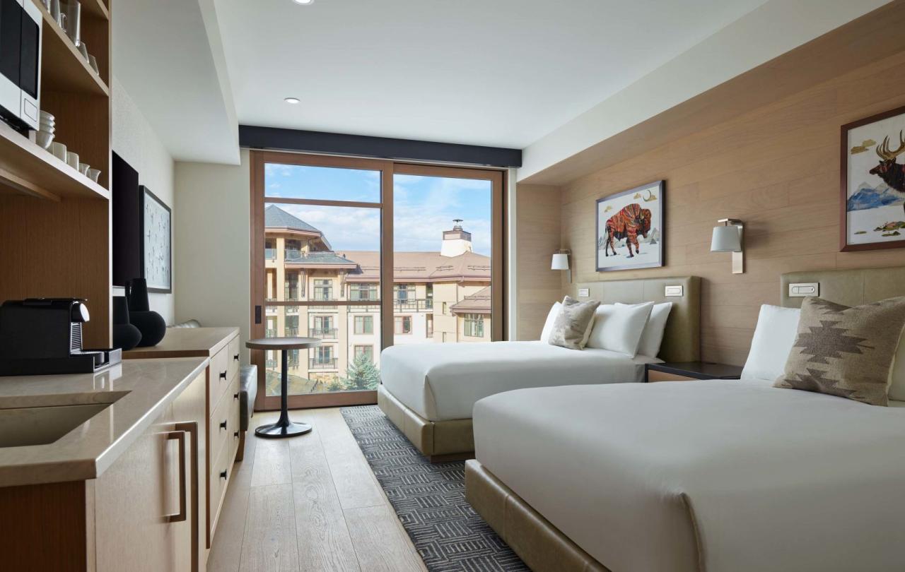 Two queen beds in a Snowmass guestroom