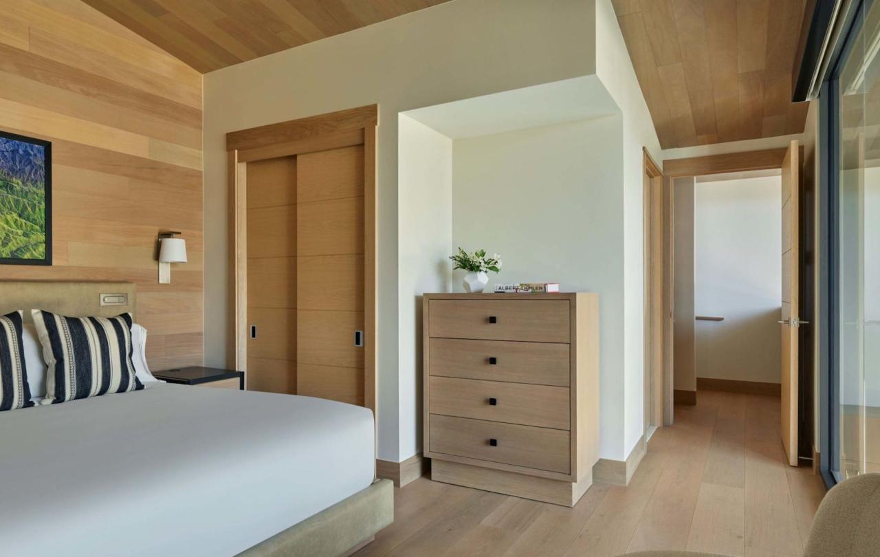 A king bed in a Cirque Two Bedroom Penthouse Loft at Viceroy Snowmass