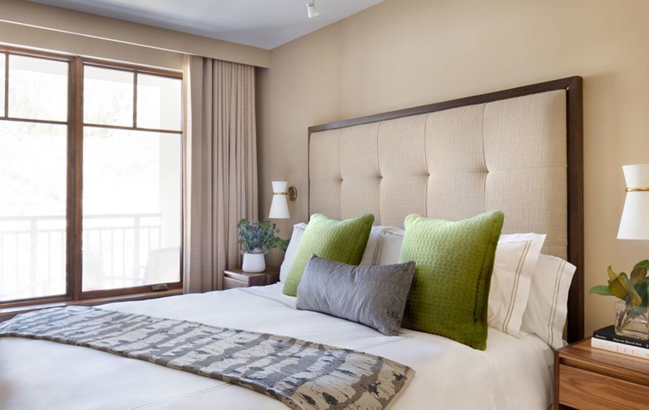 A king bed in a Mobility Accessible Pinnacle Two Bedroom, Roll-in Shower & Transfer Shower room at Viceroy Snowmass