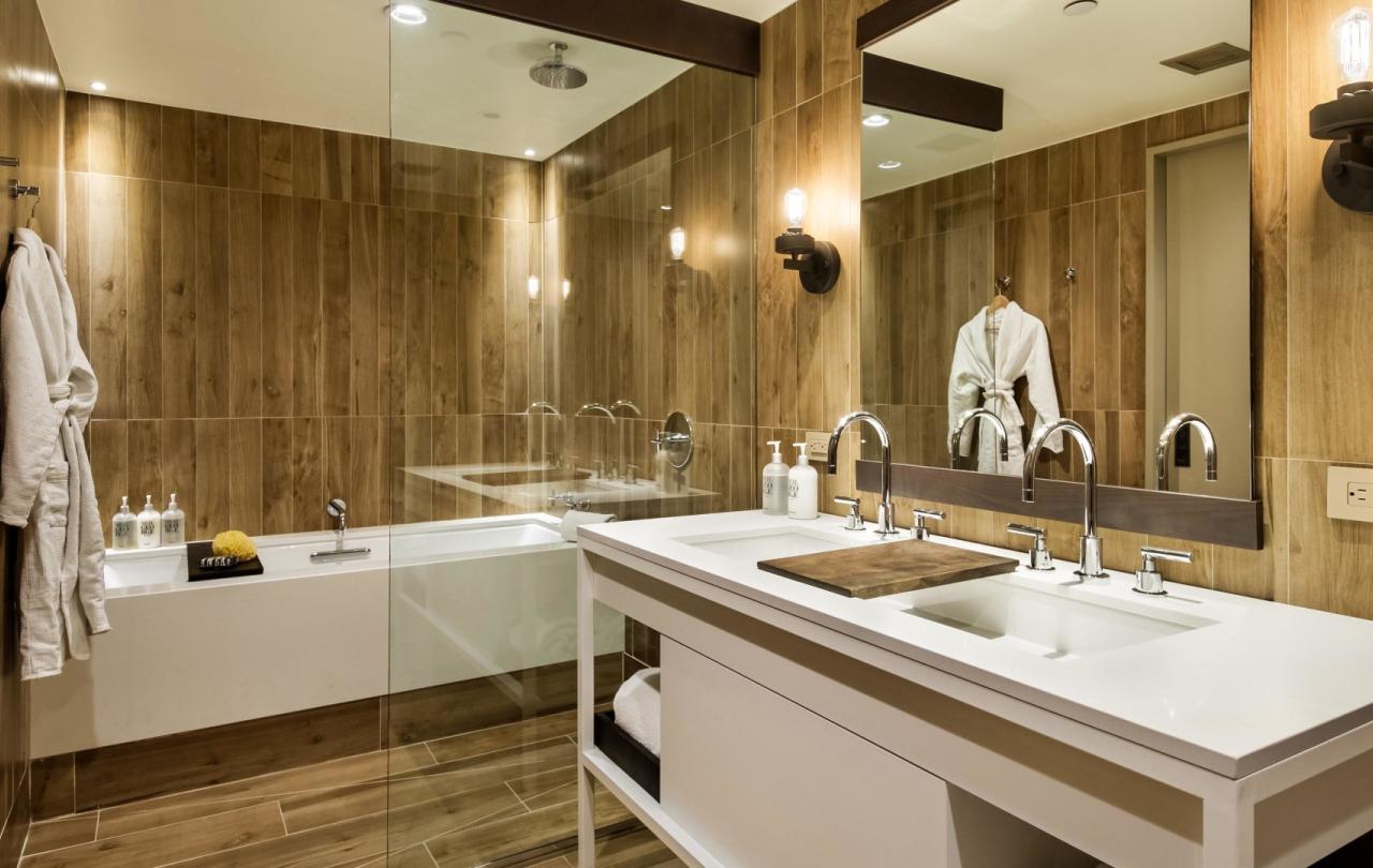 A two vanity washroom with a tub in a Pinnacle Three Bedroom Penthouse at Viceroy Snowmass