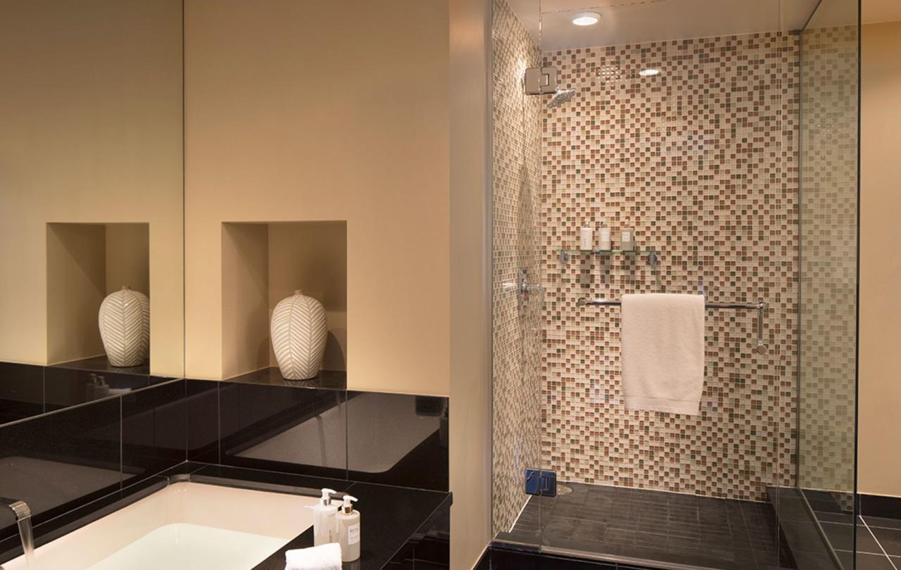 bathroom with a vanity and shower in a Pinnacle Three Bedroom Residential Suite at viceroy Snowmass