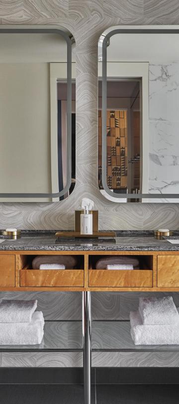 Bathroom vanity with two sinks and two mirrors