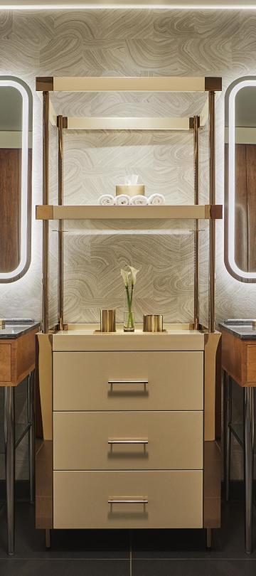 Bathroom with two vanities and a shelving unit