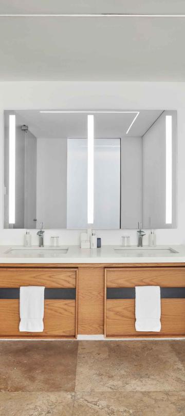 los cabos partial ocean view double sink in bathroom