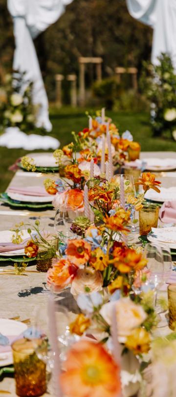 table set for a wedding outside