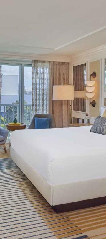 A king bed and and large space in a city view king room at Viceroy Santa Monica