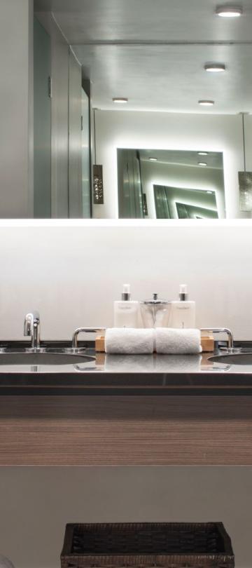 A double sink vanity in a Pinnacle Two Bedroom Premium Residence at Viceroy Snowmass