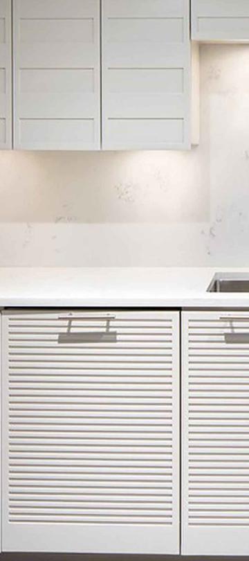 A beautiful white kitchen in a Pinnacle Two Bedroom Premium Residence at Viceroy Snowmass