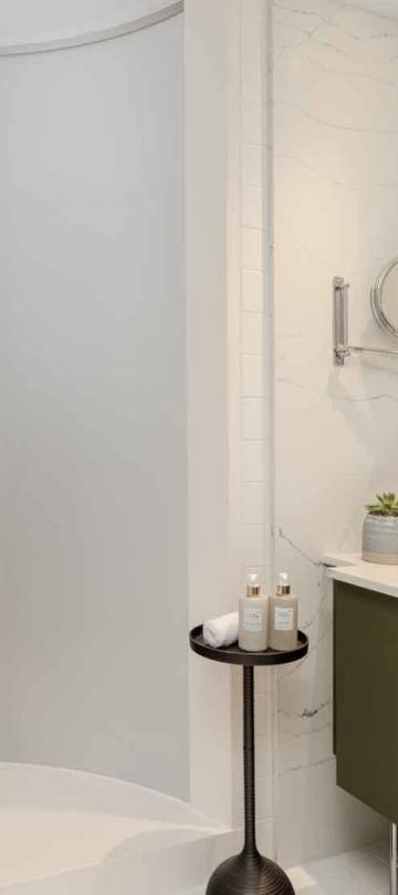 Shower and vanity in a room at Viceroy Zena Washington