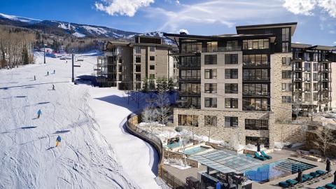 The Cirque Residences X Viceroy Snowmass alongside a ski slope