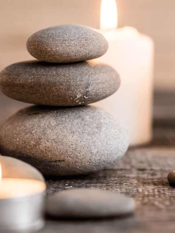 Stones and lit candles at Ombria Algarve