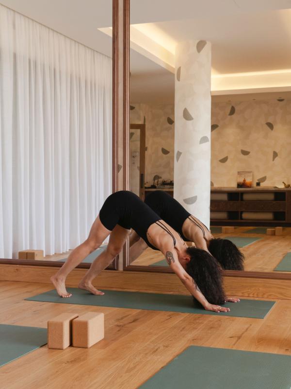 A woman in downward dog